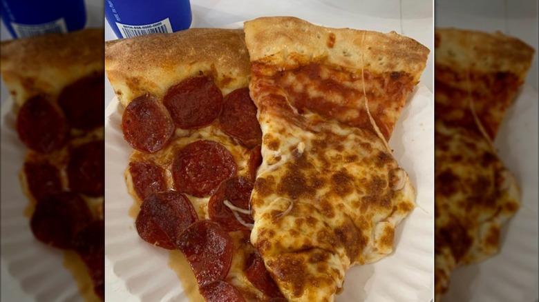 Costco pepperoni and cheese pizza slice on a paper plate