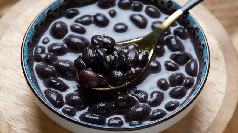 bowl of black beans with spoon