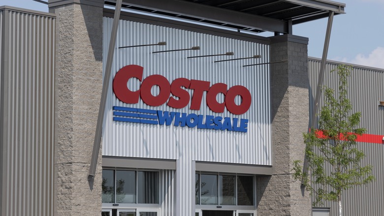 The exterior of a Costco Wholesale store during the day