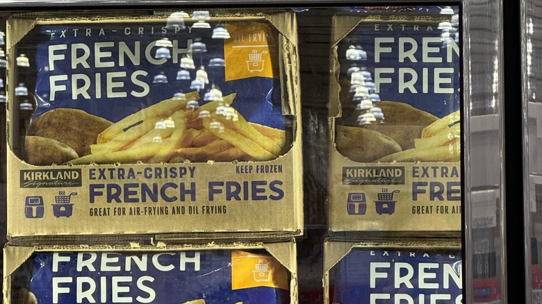 Boxes full of Kirkland Signature French Fries in a cooler at Costco