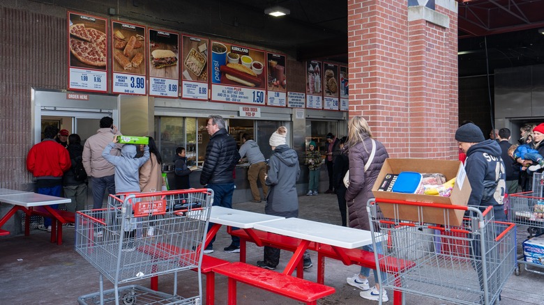 Customers at Costco food window