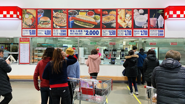 Customers line up for food at Costco in South Korea