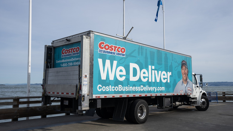 Costco truck that says "we deliver"