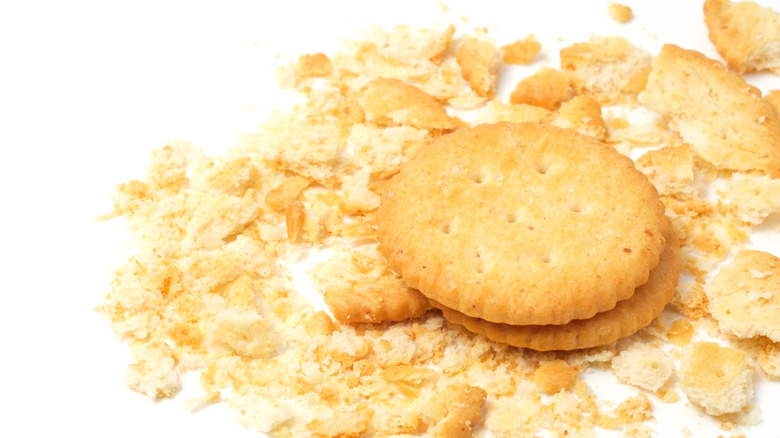 A small stack of Ritz crackers in cracker crumbles