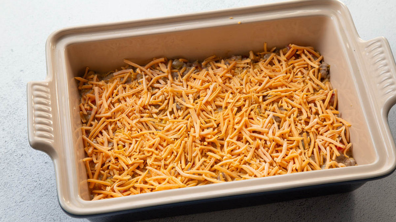 casserole with shredded cheese on top