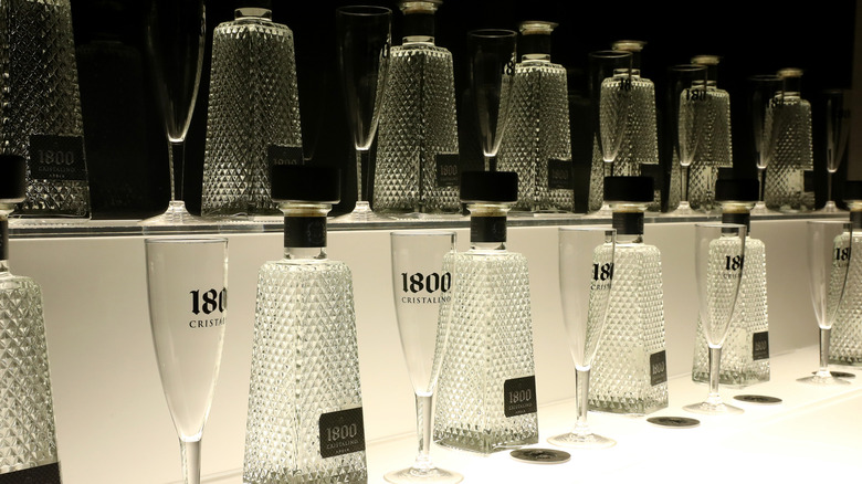 Glasses and bottles of 1800 cristalino tequila