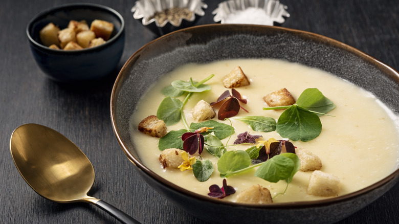 potato soup with herb garnish