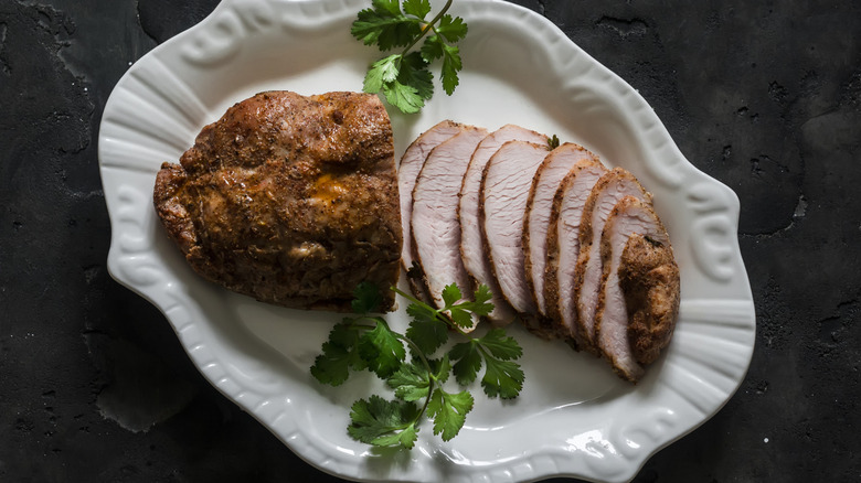 Turkey pastrami on a white plate