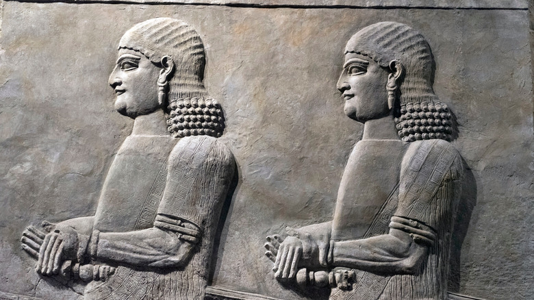 ancient mesopotamian bas relief of two men