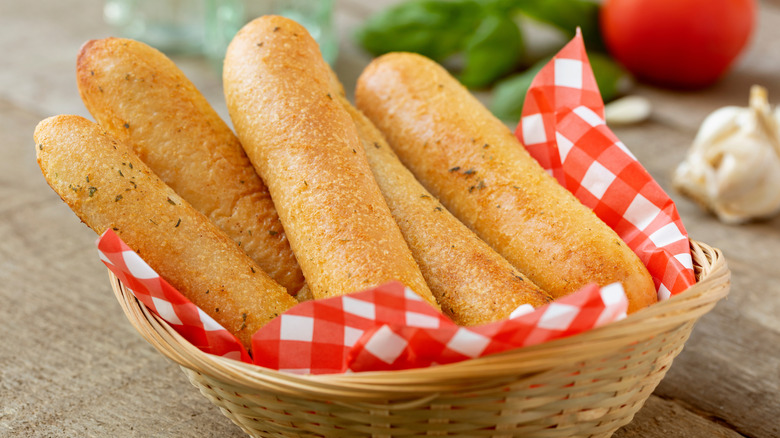 a basket of breadsticks