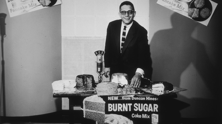 Vintage ad with a man in a suit presenting a cake