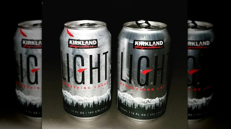 Two cans of Kirkland Signature light beer