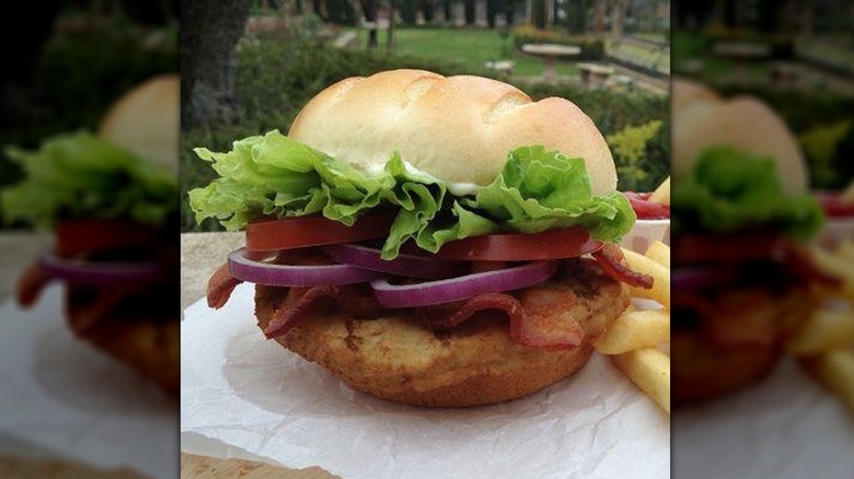 Turkey burger with lettuce, tomatoes, and onions from Burger King