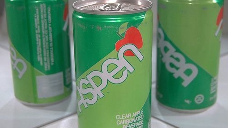 Cans of apple-flavored Aspen soda