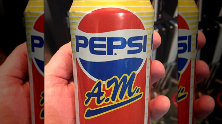 Handheld can of Pepsi A.M.