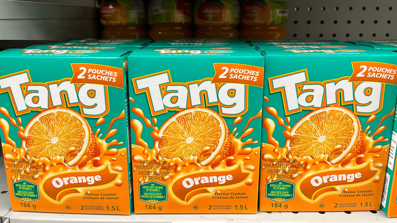 Boxes of Tang drink pouches sit on a shelf