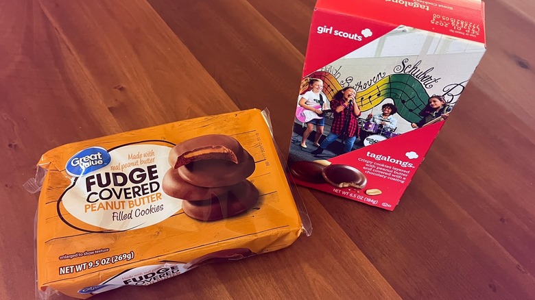 Two packets of cookies sitting on a table.