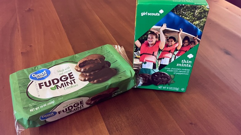 Two packets of cookies sitting on a table.