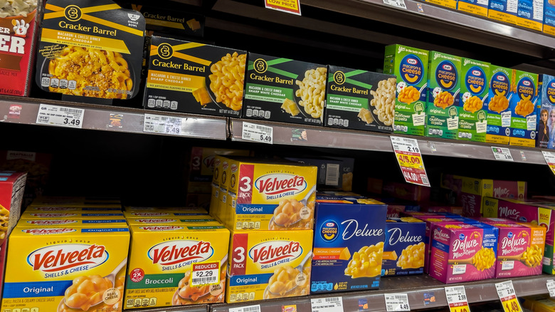 Boxes of mac and cheese on grocery store shelves