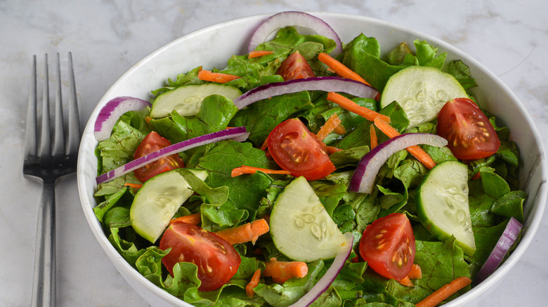 a basic green salad in a bowl