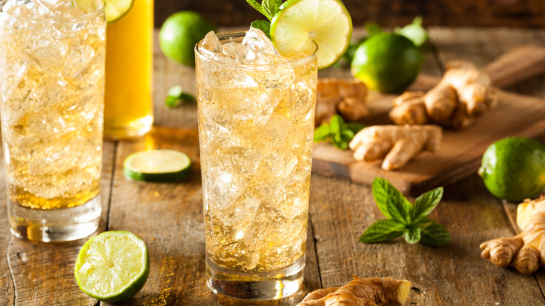 ginger beer in glass with lime wheel