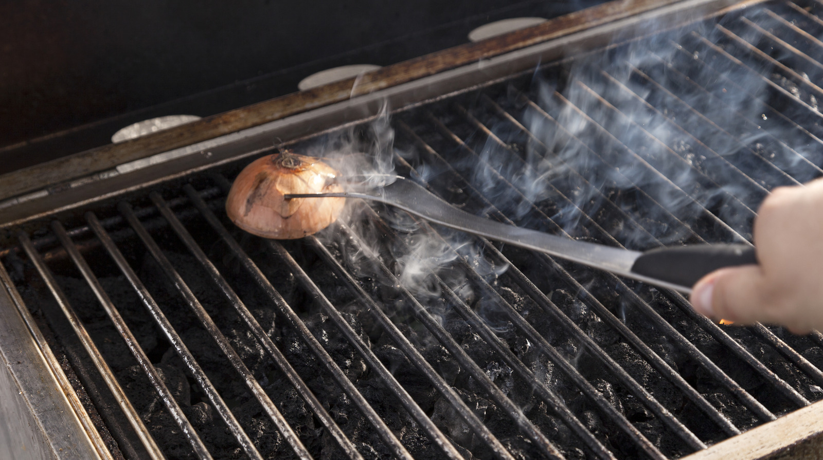 Does Half An Onion Really Work To Clean Your Grill?