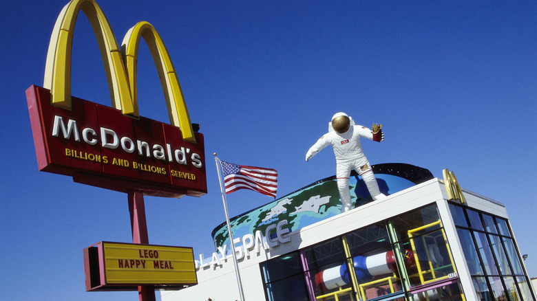 A McDonald's Location that features a PlaySPACE playground and an astronaut statue on top of the building.