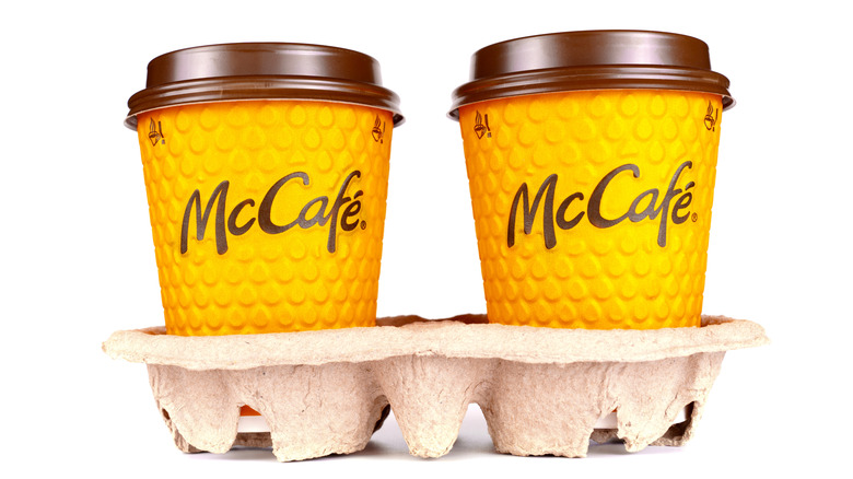 McCafé cups to go on a white background.