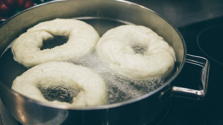 Bagel dough in boiling water