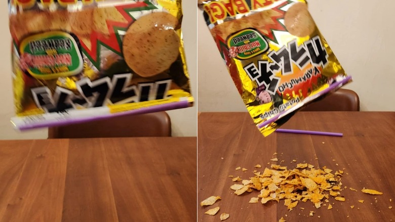 Chip bag held upside down, chips spilled onto table