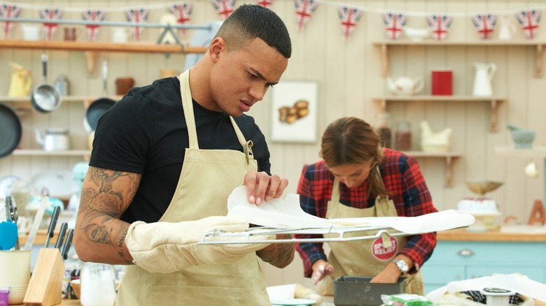 baker checks dessert on cooling rack