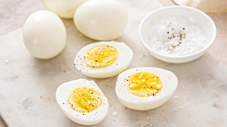 Hard boiled eggs cut in half to expose the yolk