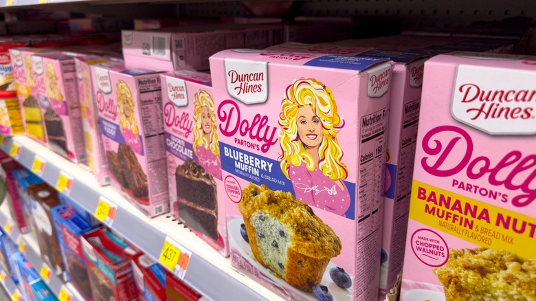 Dolly Parton's cake mixes on a supermarket shelf.