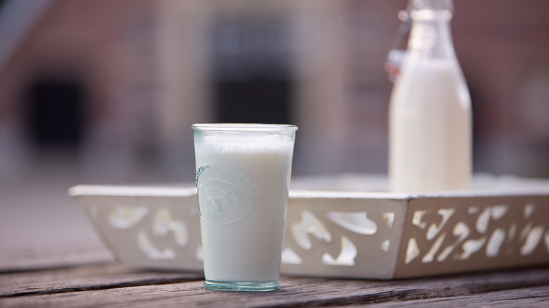 A glass of raw milk on a table