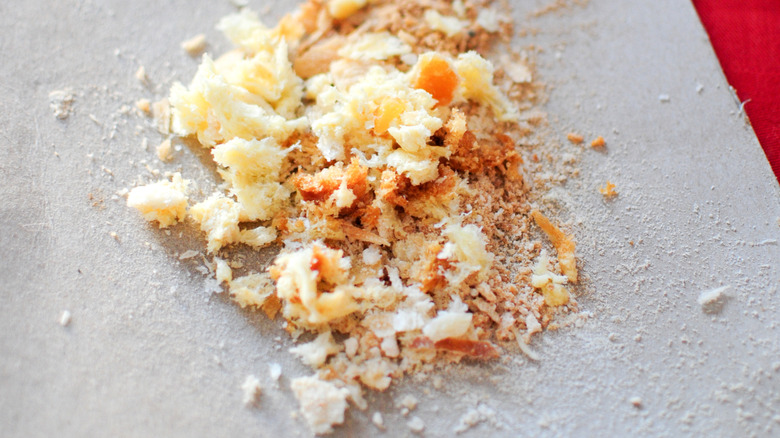 Closeup of breadcrumbs on parchment paper