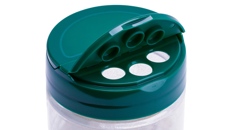 Close-up of plastic parmesan cheese container lid