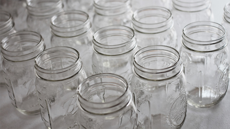 Many empty mason jars lined up