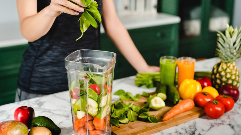 Woman making smoothie