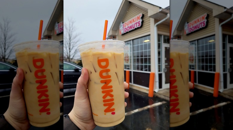 Person holding Dunkin' Cookie Dough Swirl