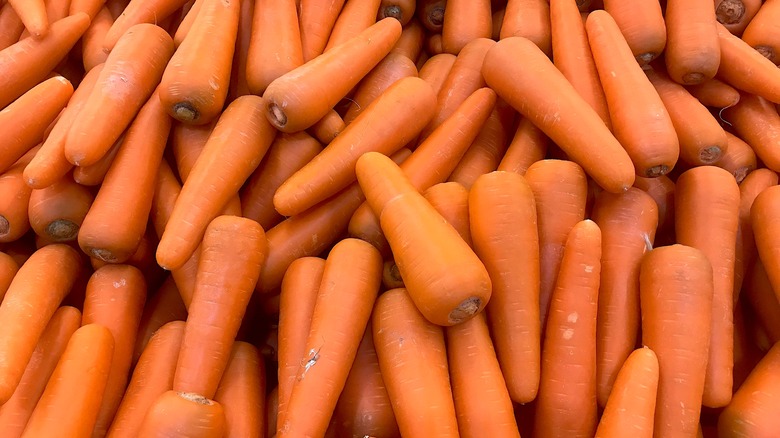 An image of raw whole carrots