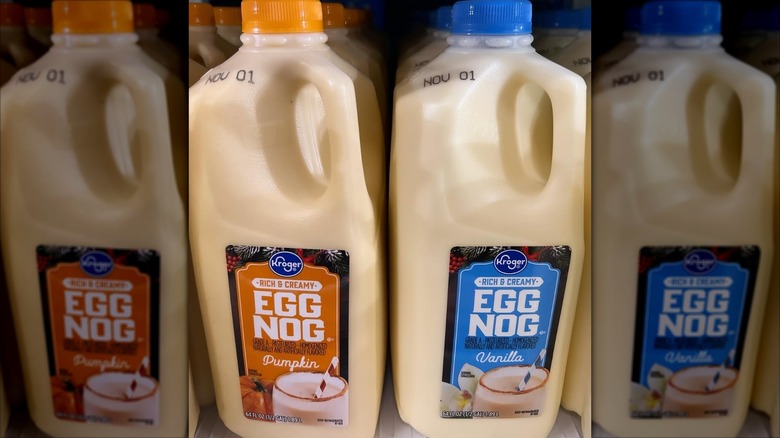 Bottles of eggnog in refrigerator