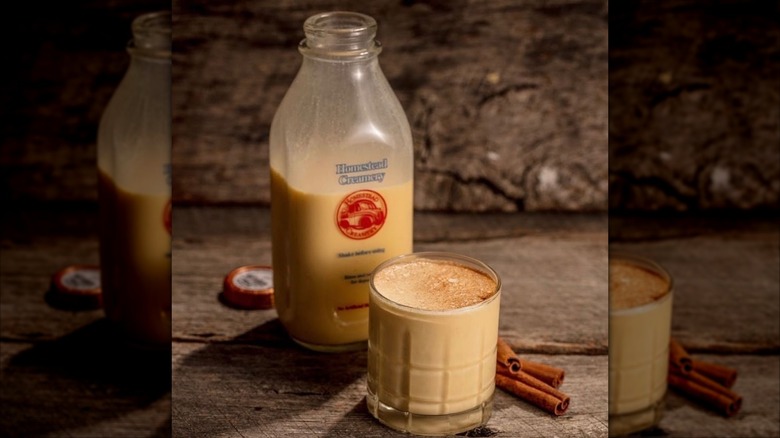 Bottle and glass of Homestead Creamery eggnog