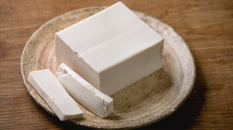 Sliced silk tofu on small plate