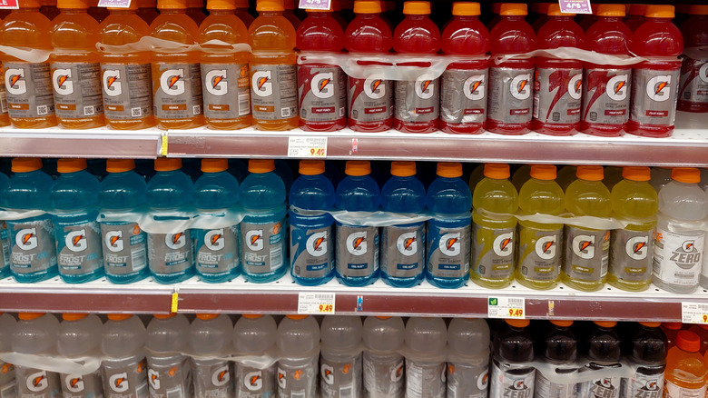 Bottles of various Gatorade flavors on a store shelf