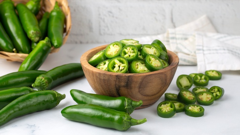 sliced jalapeños in a bowl