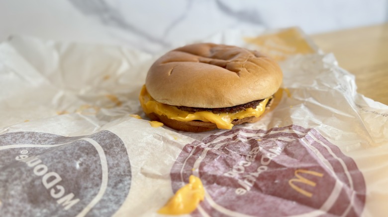 McDouble on its wrapper with stuck cheese