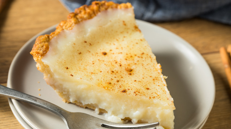 closeup of sugar cream pie dusted with cinnamon