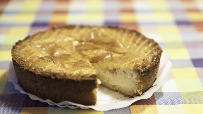 Gâteau basque on colorful checked tablecloth