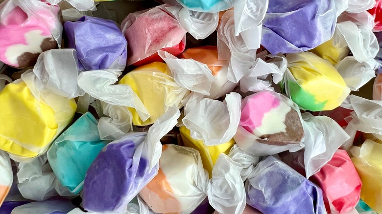 pile of colorful taffy in paper wrappings