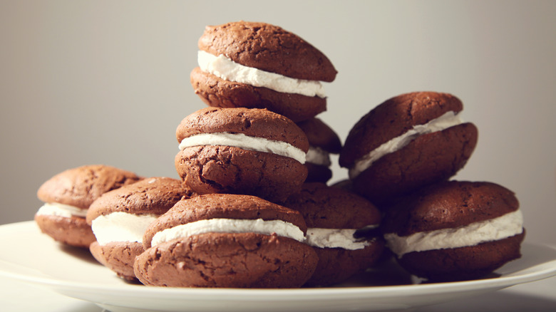 stacked whoopie pies on plain background